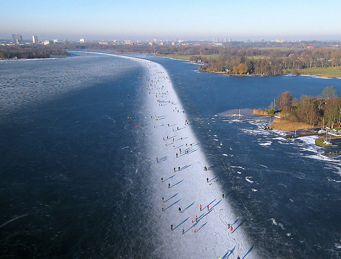 Ice skating on Paterswoldse Meer, a lake just South of the city of Groningen in the Netherlands.