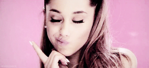 Ariana-Grande-tapping-finger-on-face-GIF-Problem-music-video-1442853251