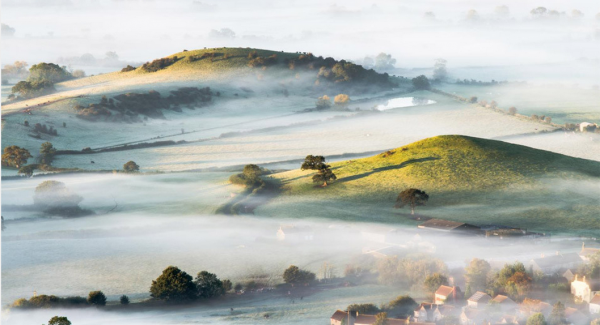 Mist over countryside in Southwest England. 